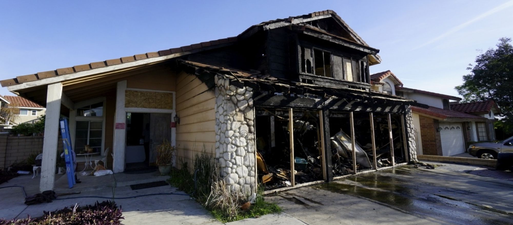 fire damage poinciana - before